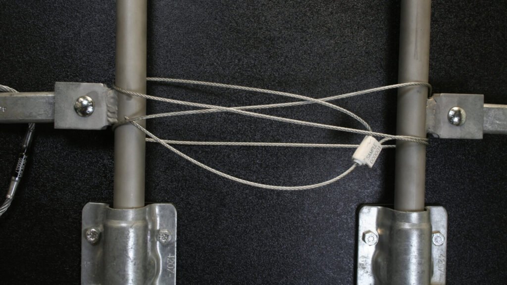Cable Seal's Flexible Adjustment Showing a cable seal wrapping around a valve wheel.