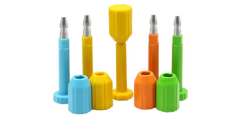 Array of different colored bolt seals held side-by-side to illustrate the "twin seal" threat