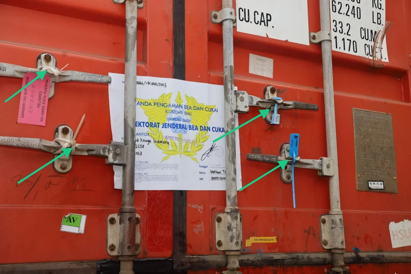 A graphic showing a container door with three arrows pointing to it, labeled "Bolt Seal," "Cable Seal," and "Plastic Seal."
