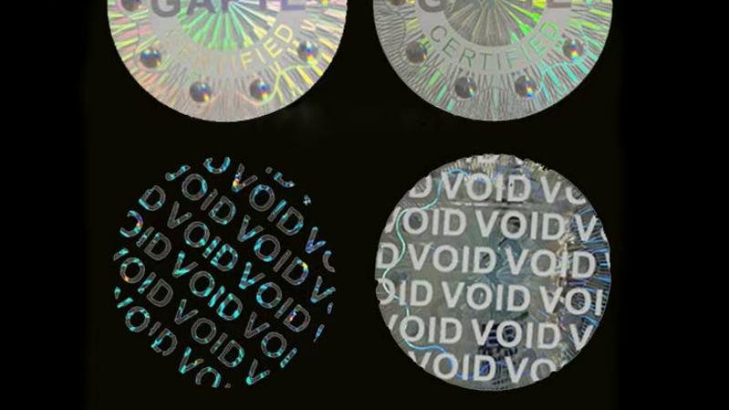 Parallax Effect in a True Hologram Demonstrating the parallax effect, where tilting a genuine hologram reveals hidden layers or movement.