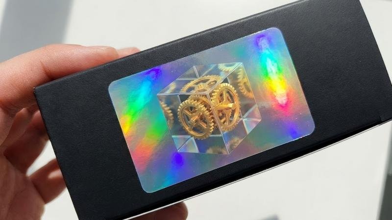 A hologram with a true 3D effect, showing an object that appears to float deep inside the label.