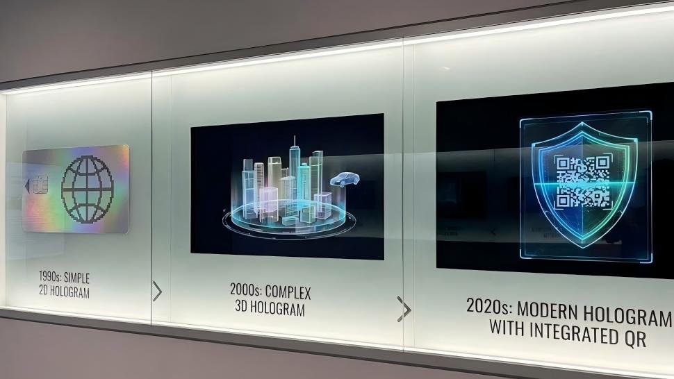 A simple 2D hologram from the 1990s. In the middle, a complex 3D hologram from the 2000s. On the right, a modern hologram with an integrated QR code.