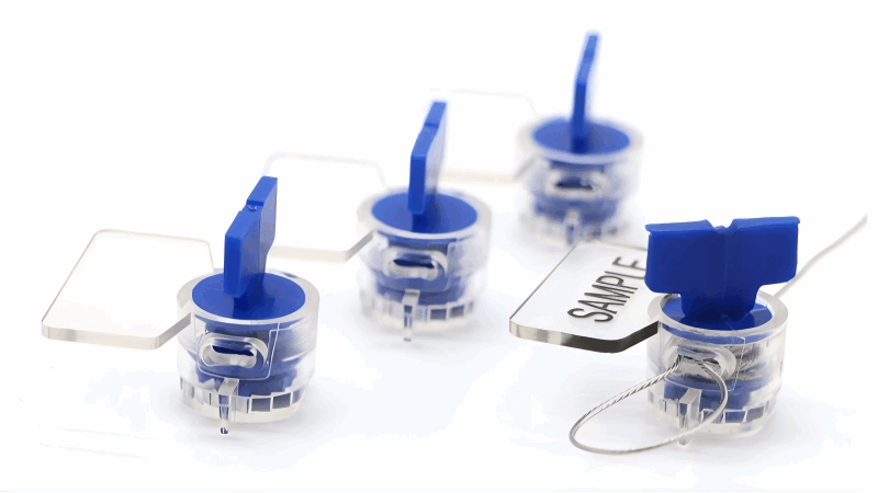 Close up of a transparent locking chamber showing a damaged metal spring clip